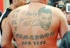 http://www.totalprosports.com/wp-content/uploads/2009/10/mike-tyson-tattoo-467x400.jpg