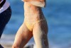 http://www.totalprosports.com/wp-content/uploads/2011/02/Arianny-Celeste-Gets-All-Sandy-At-Miami-Beach-5-203x400.jpg