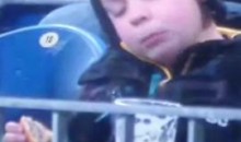 Kid Enjoys A Beer During A Soccer Match (Video)