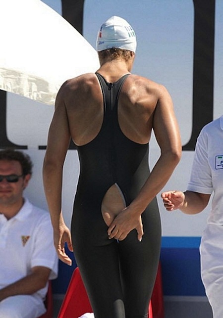 swimmer swim suit splits open