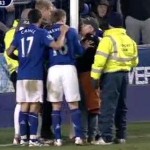 everton fan handcuff to goal post