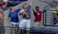 Fan Catches Foul Ball With One Hand While Holding Baby…No Big Deal (Video)