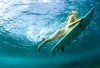 http://www.totalprosports.com/wp-content/uploads/2012/08/surf_girls_08-520x346.jpg