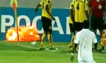 Soccer Player Almost Loses A Hand After Picking Up A Live Smoke Grenade Off The Field (Video)