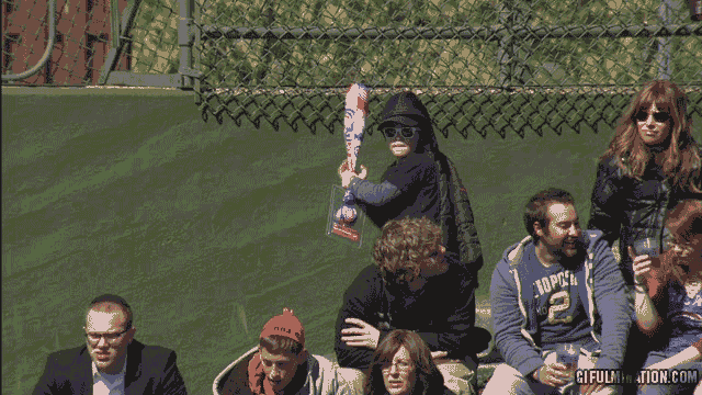cubs fan hits other fan with bat baseball fan gifs