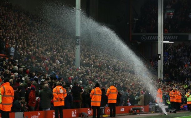 liverpool fans soaked by faulty sprinkler