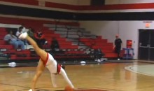 College Cheerleader Sinks Front-Flip Half-Court Shot (Video)