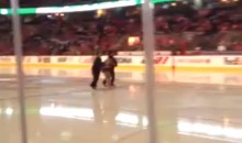 Streaker Jumps Onto Ice at Calgary Flames Game (Video)