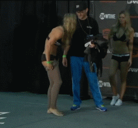 ronda-rousey-getting-undressed-hot-female-athlete-gifs.gif