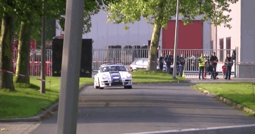 Porsche-964-RSR-Crashes-into-Cement-Barrier-and-Lands-in-a-Pond.gif