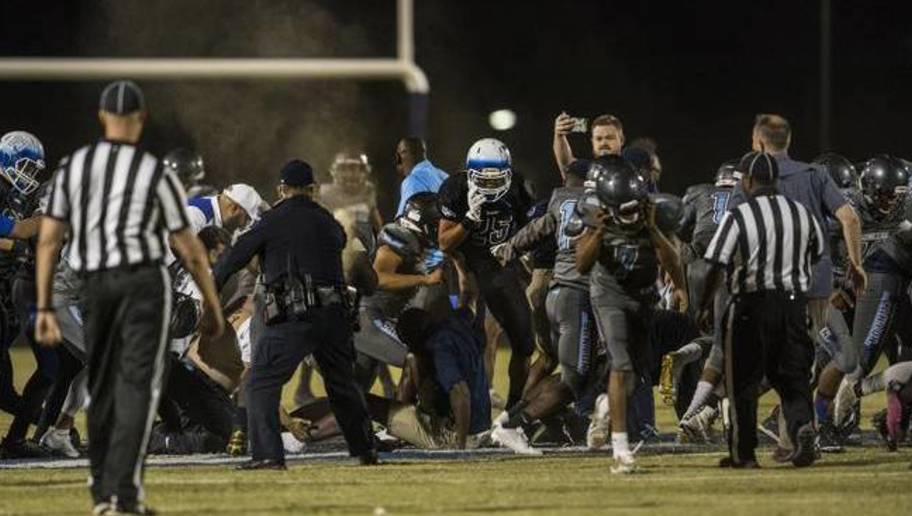 Officer uses pepper spray during high school football fight