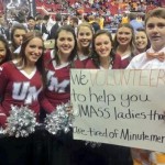 Young Tennessee Fan Takes Terrific Picture with UMass Cheerleaders