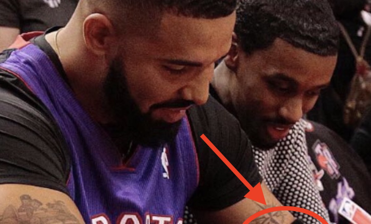 Drake Caught Covering Up His Curry & Durant Tattoos At Game 1 Of NBA Finals (PICS)