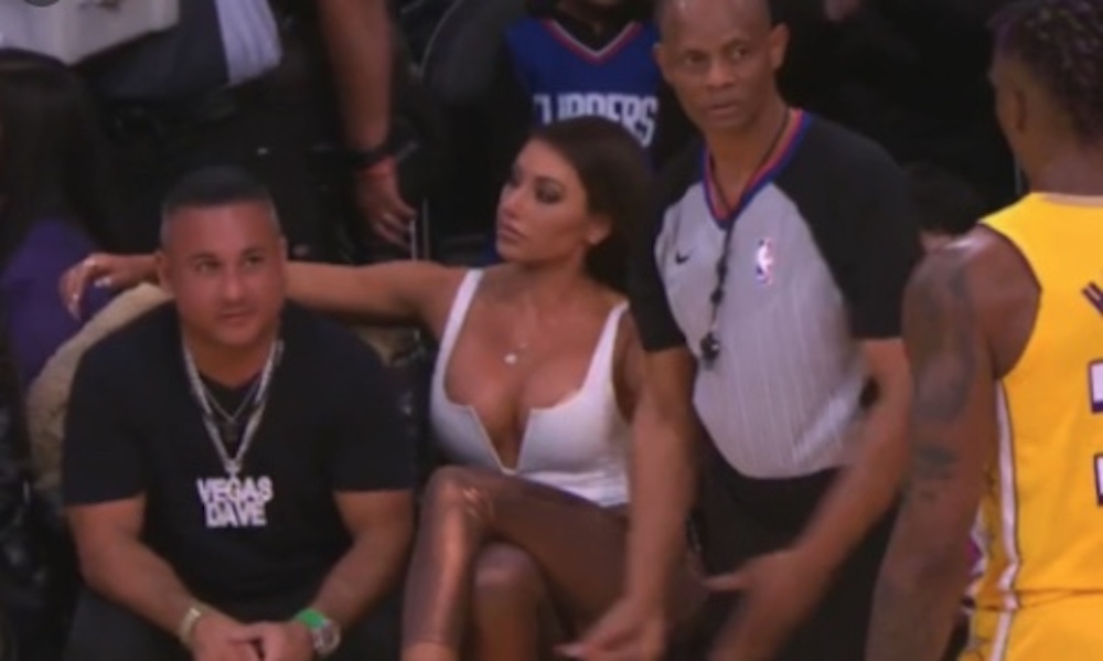 Holly Sonders courtside with Vegas Dave at Lakers game
