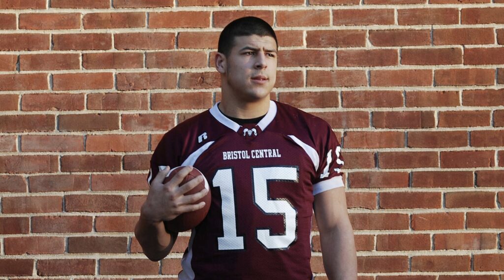 Aaron Hernandez poses with football during his days at Bristol Central High School.