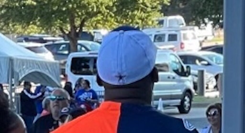 Cowbosy fan walking to AT&T Stadium.