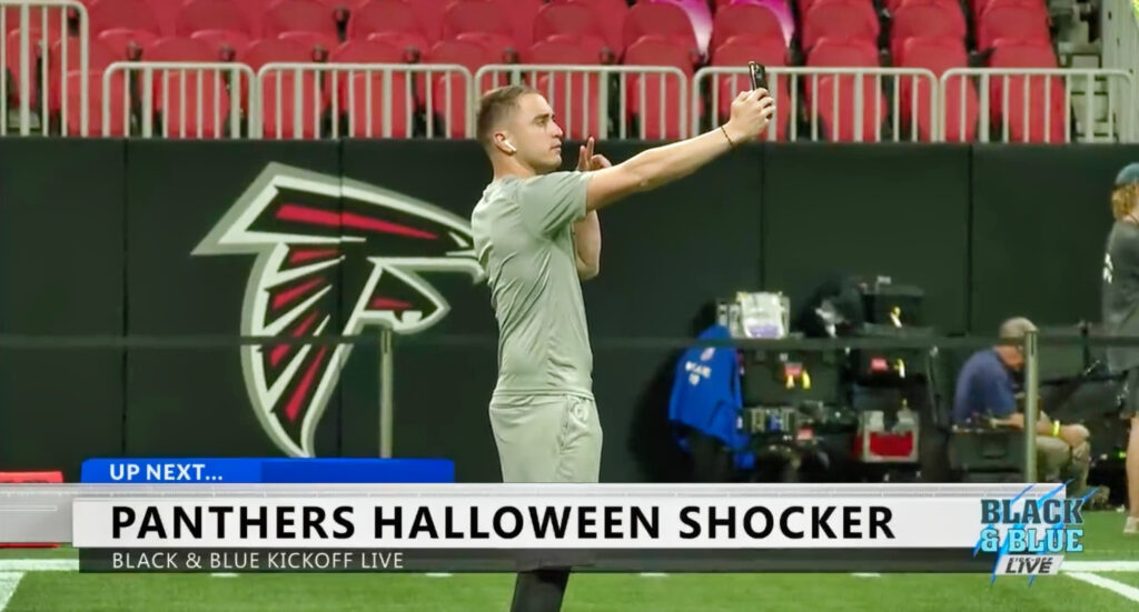 Panthers kicker Eddy Piñeiro taking selfies before game vs falcons.