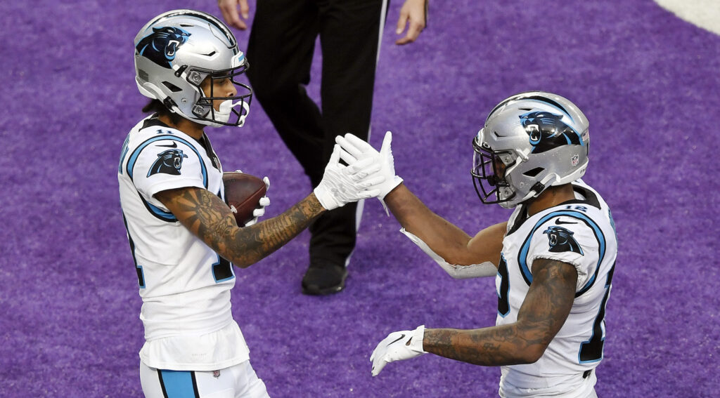 Robby Anderson and D.J. Moore celebrate a touchdown together.