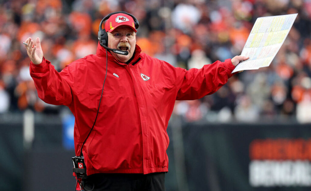 Chiefs head coach Andy Reid raises his arms in frustration.