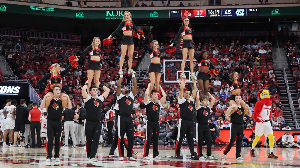 Louisville Cardinals cheerleaders cheer during a game against UNC.