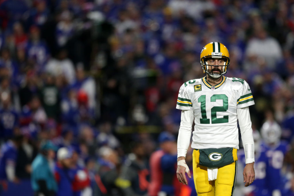 Aaron Rodgers in uniform looking distraught