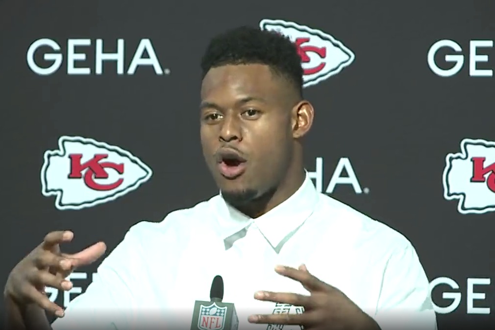 JuJu Smith-Schuster with mouth open speaking to reporters