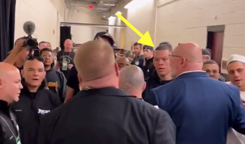 Nate Diaz and his crew engage in an altercation with Jake Paul's crew backstage.