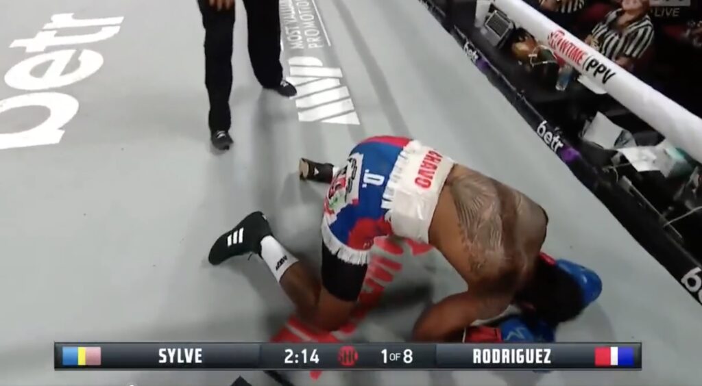 Braulio Rodriguez is on the ground after being knocked out by Ashton Sylve.