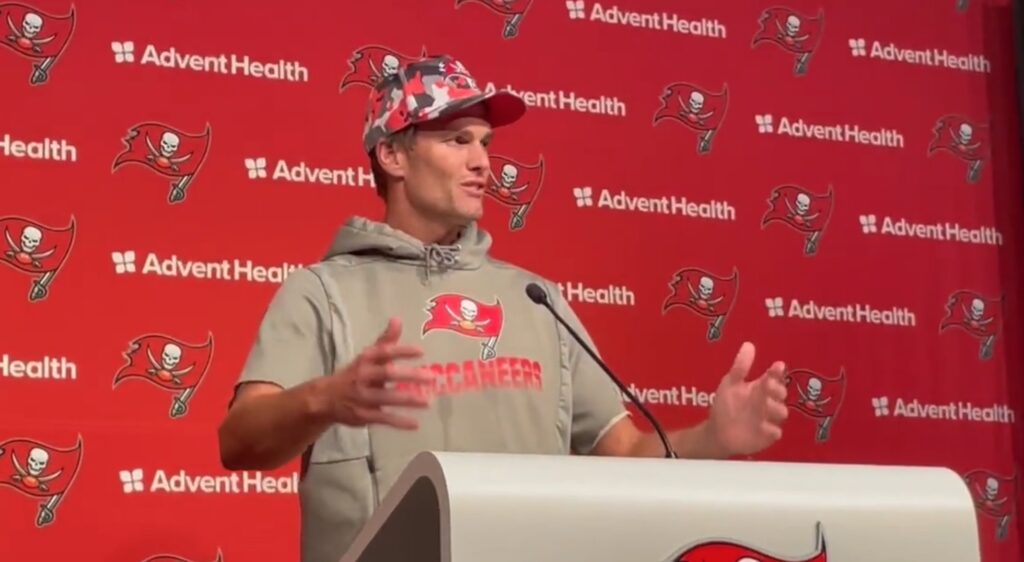 Bucs QB Tom Brady speaks to reporters at a press conference.