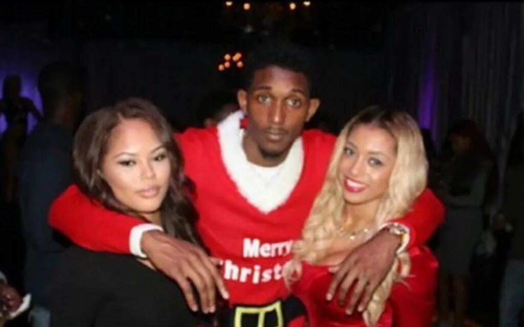 Lou Williams hugging two women said to be both of his girlfriends