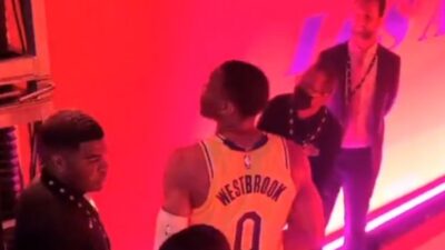 russell westbrook looking up in the stands at Crypto.com arena at a heckling Lakers fan
