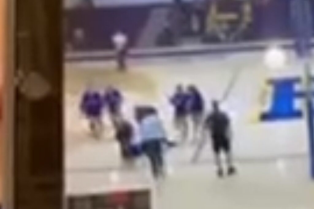 Volleyball player surrounded after taking ball to the face