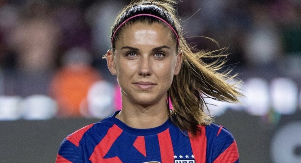 Alex Morgan looks at camera before the game.