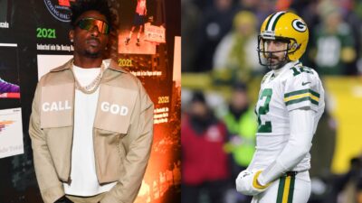 Antonio Brown posing in call god outfit while Aaron Rodgers is in uniform