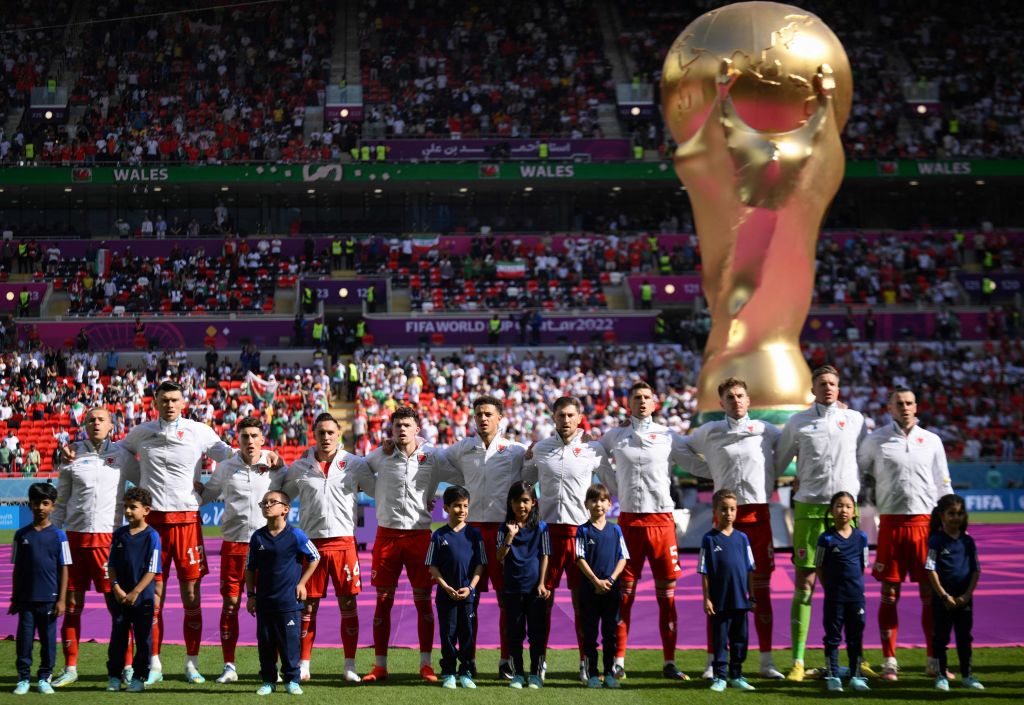 Iran soccer team standing for anthem