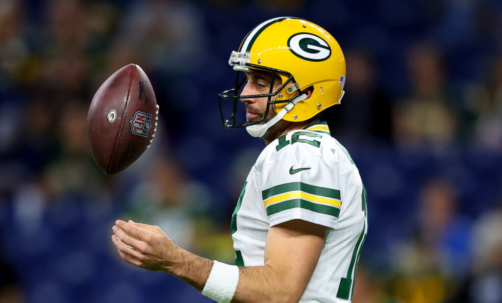 Aaron Rodgers juggles a ball before the game.