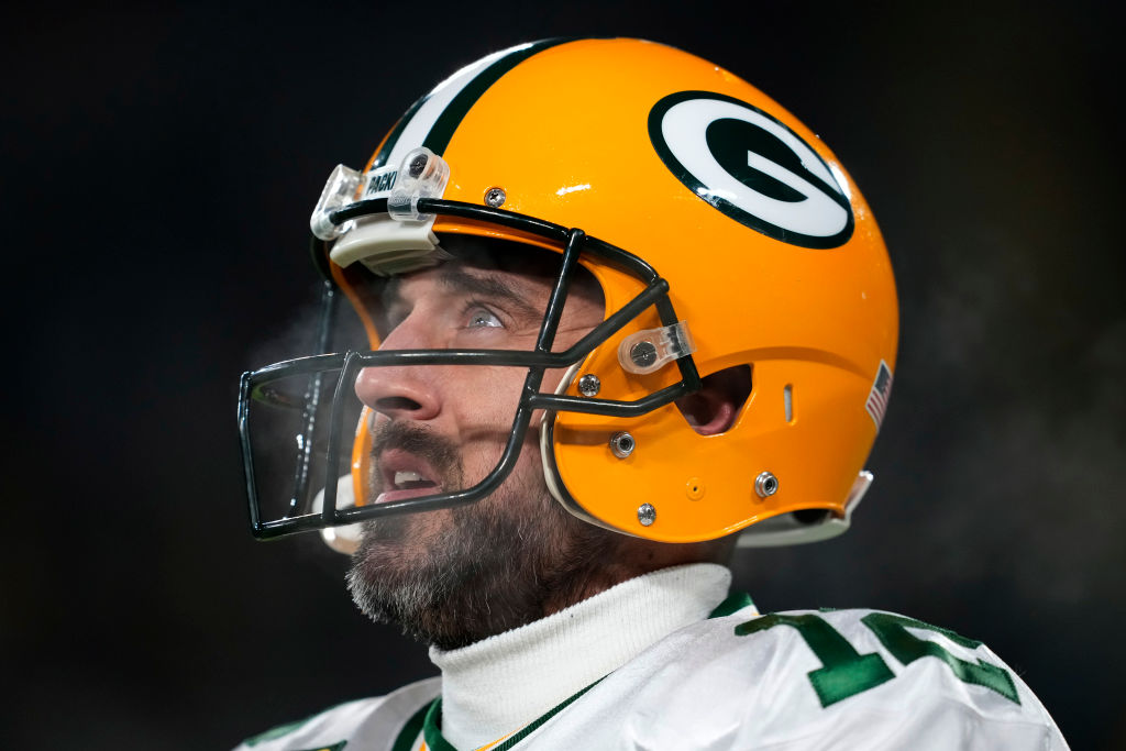 Aaron Rodgers looking up while steam comes from mouth
