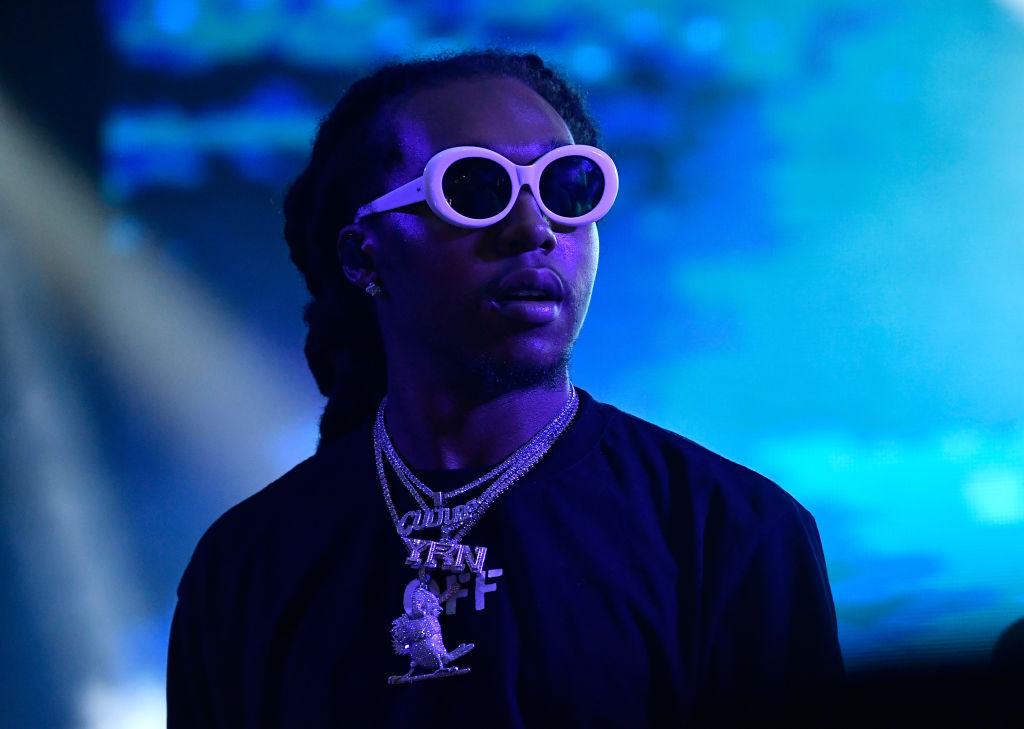 Rapper Takeoff with white glasses on