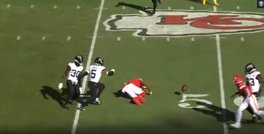 Juju Smith-Schuster lays on the ground after taking a hit.