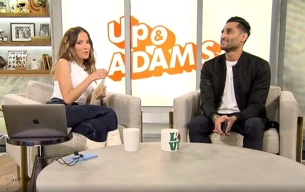 Shams Charania and Kay Adams sitting on a couch