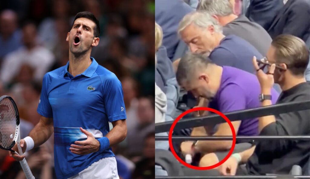 Novak Djokovic with his mouth open while several men are seated in the stands at Tennis match