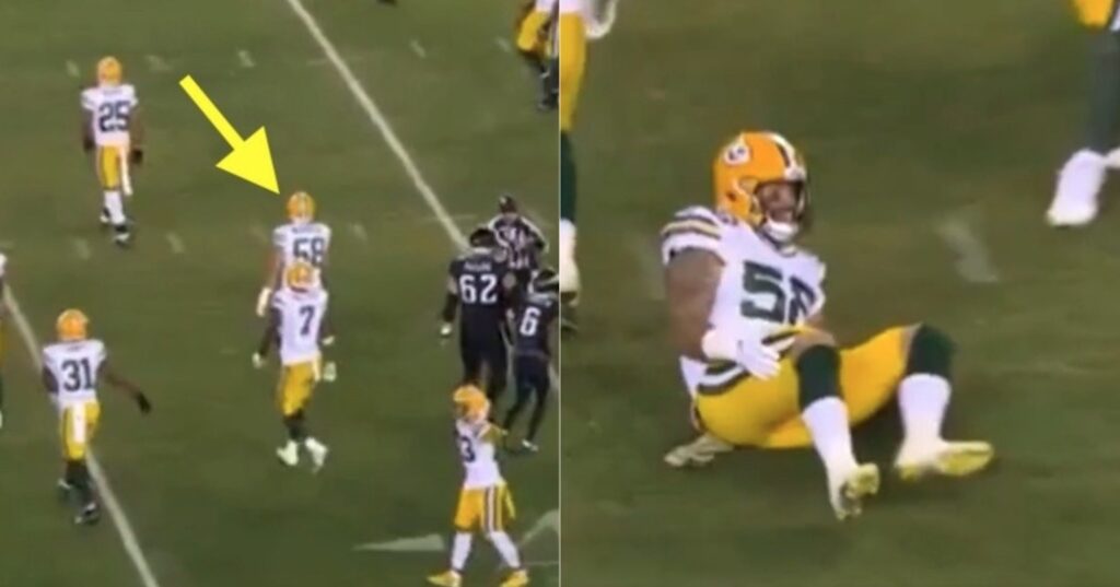 A Packers player fakes an injury on the field.