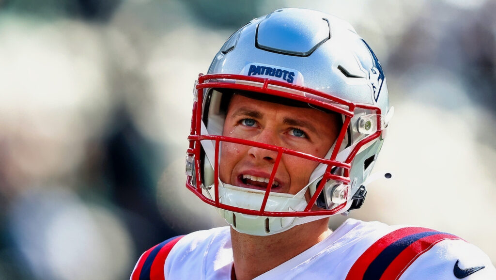 Mac Jones #10 of the New England Patriots reacts during warms ups before a game against the New York Jets.