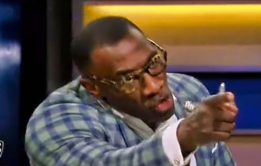 Shannon Sharpe pointing his finger