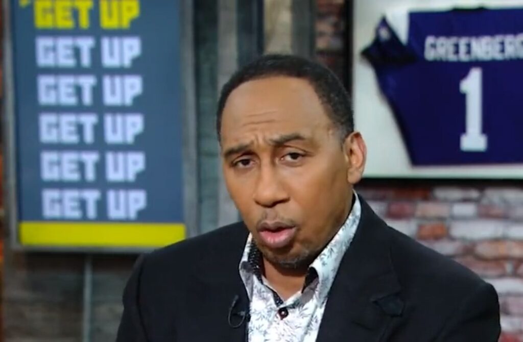 Stephen A. Smith with suit on on sports show