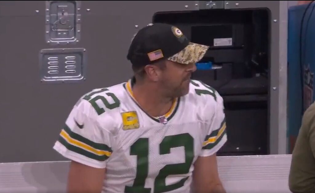 Aaron Rodgers sitting on bench