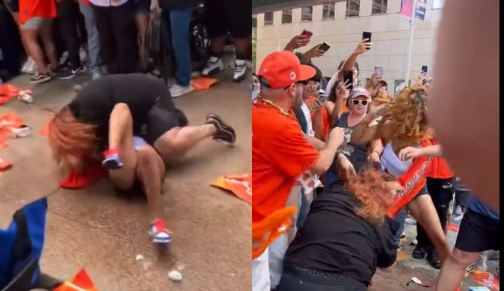 Two women fighting as Astros parade