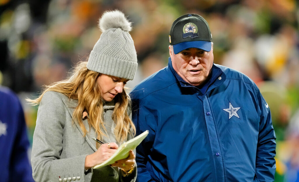 FOX reporter Erin Andrews speaking with Dallas Cowboys head coach Mike McCarthy.