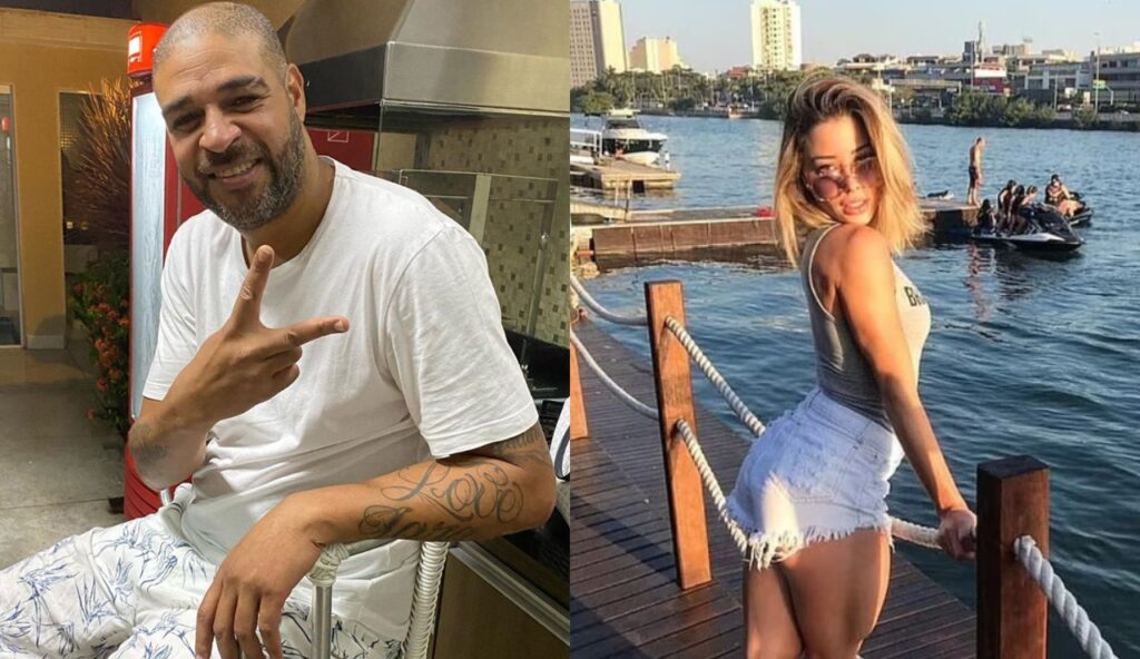 Adriano giving peace sign while his wife poses for picture at lake