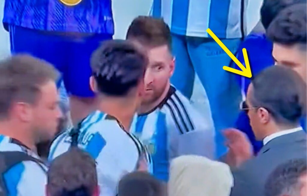Argentina star Lionel Messi looks at Salt Bae after leading team to World Cup championship.